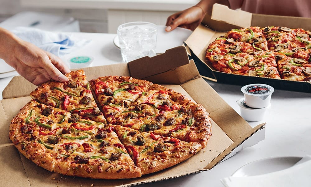 Dominos Pizza earnings delivery