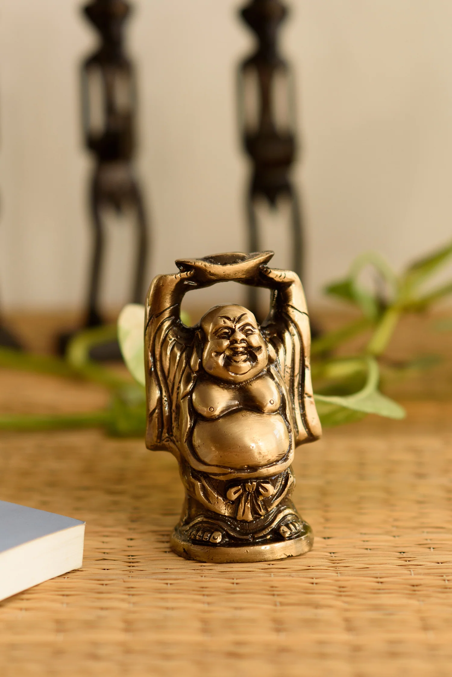 વાસ્તુ ટિપ્સઃ વાસ્તુ અનુસાર લાફિંગ બુદ્ધા સાથે જોડાયેલી આ ખાસ.webp